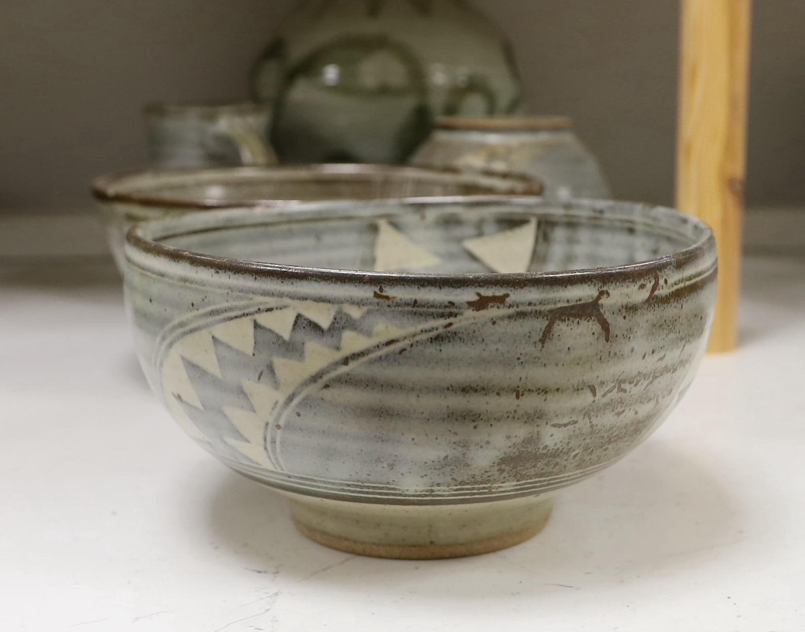 A 1961 Studio pottery vase and two bowls, a Studio pottery 'Gloucester' vase and a jug, largest 28cm high